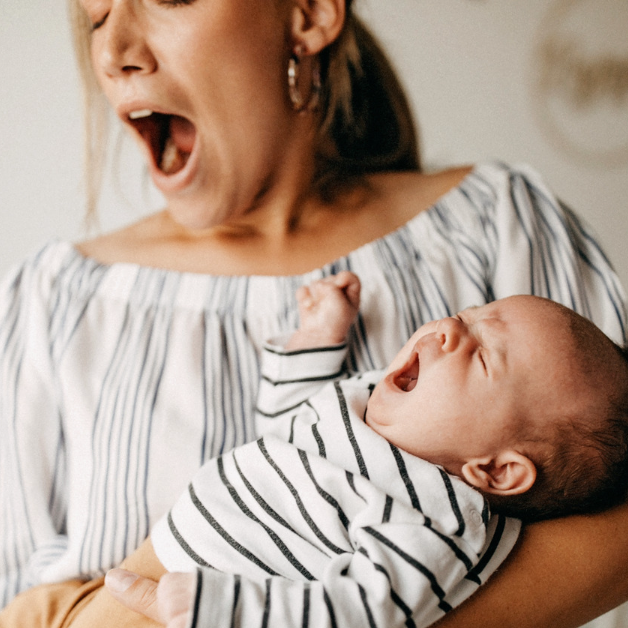 Tired baby and mom